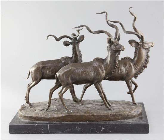 A bronze of three ibex